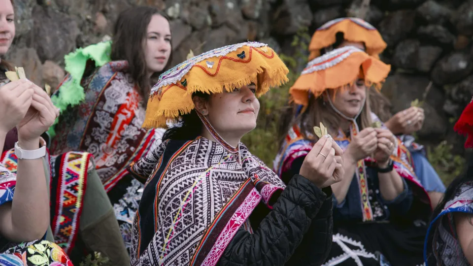 Tourist at pachamama ceremony | Ultimate Trekking