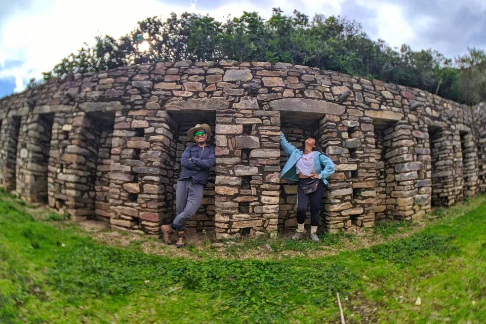 Couple taking photos in Choquequirao | Ultimate Trekking