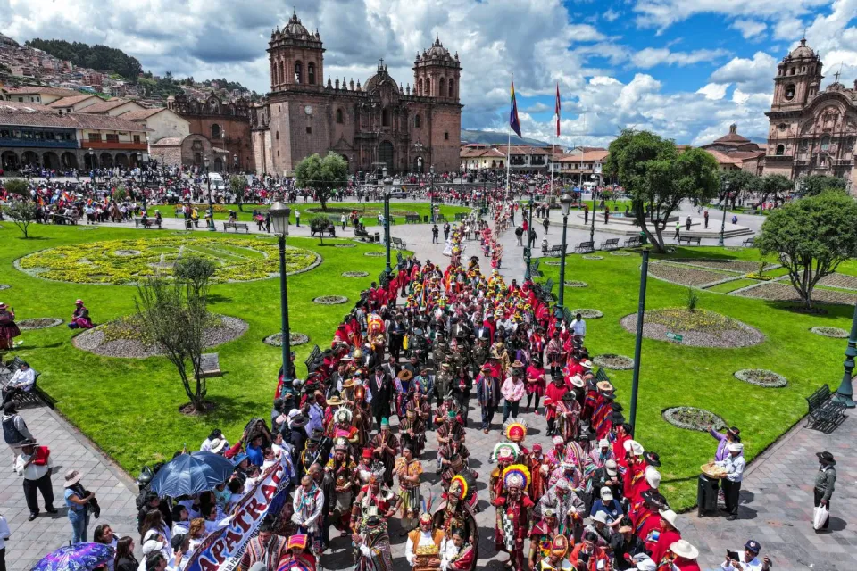 Procession in the Plaza de Armas of Cusco with traditional costumes | Ultimate Trekking