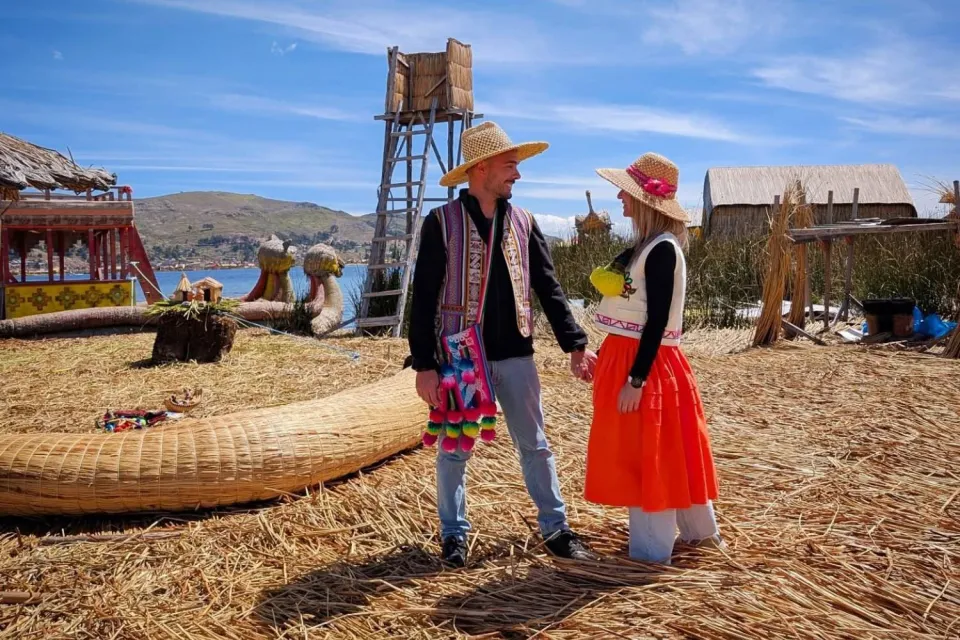 A couple on the Uros island of Lake Titicaca | Ultimate Trekking