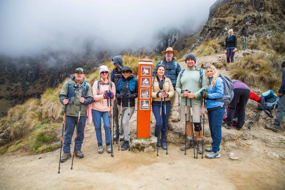 Group of tourists in the highest part of the Inca Trail | Ultimate Trekking