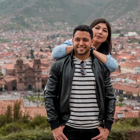 Couple taking a photo at the San Cristobal viewpoint | Ultimate Trekking