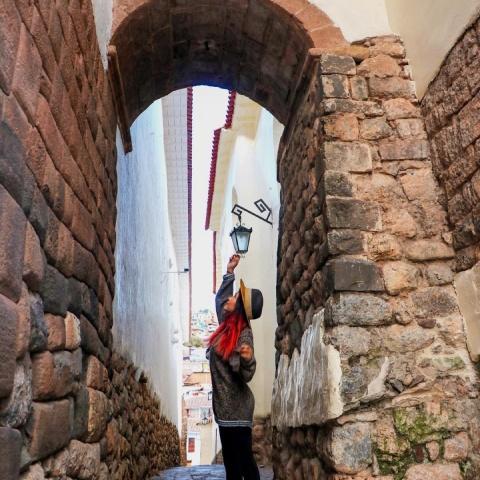 girl taking a photo on Snake Street | Ultimate Trekking