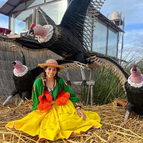 Tourist dressed in traditional Puno clothing on the island of Uros | Ultimate Trekking