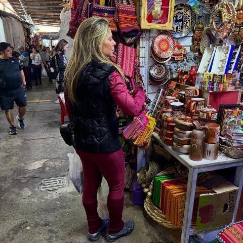 Tourist shopping inside the San Pedro market | Ultimate Trekking
