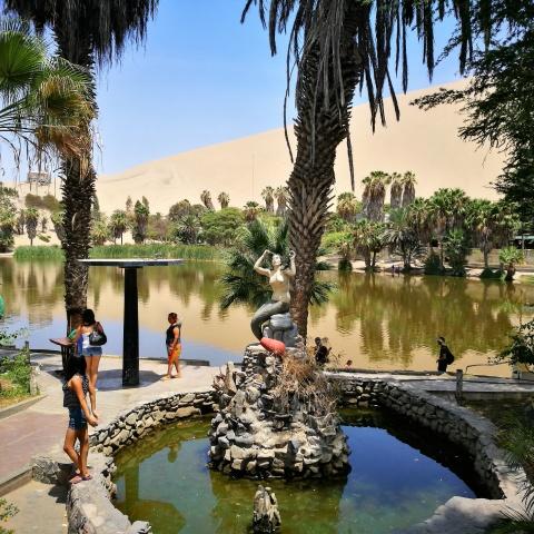 statue commemorating the Huacachina mermaid | Ultimate Trekking